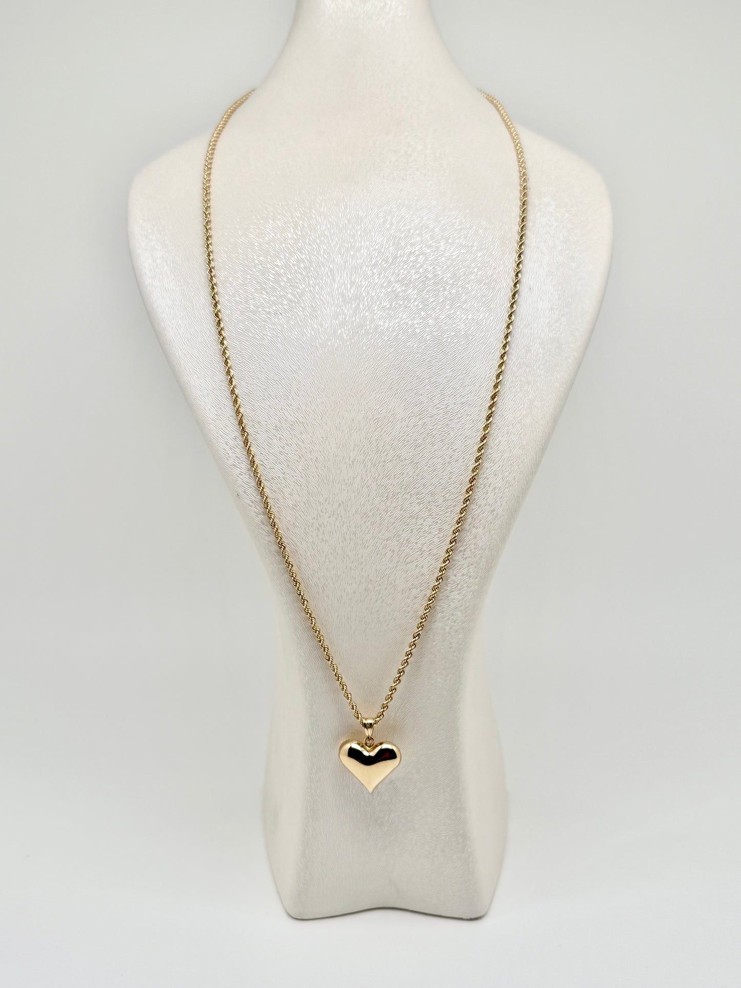 Gold twisted chain with gold heart pendant