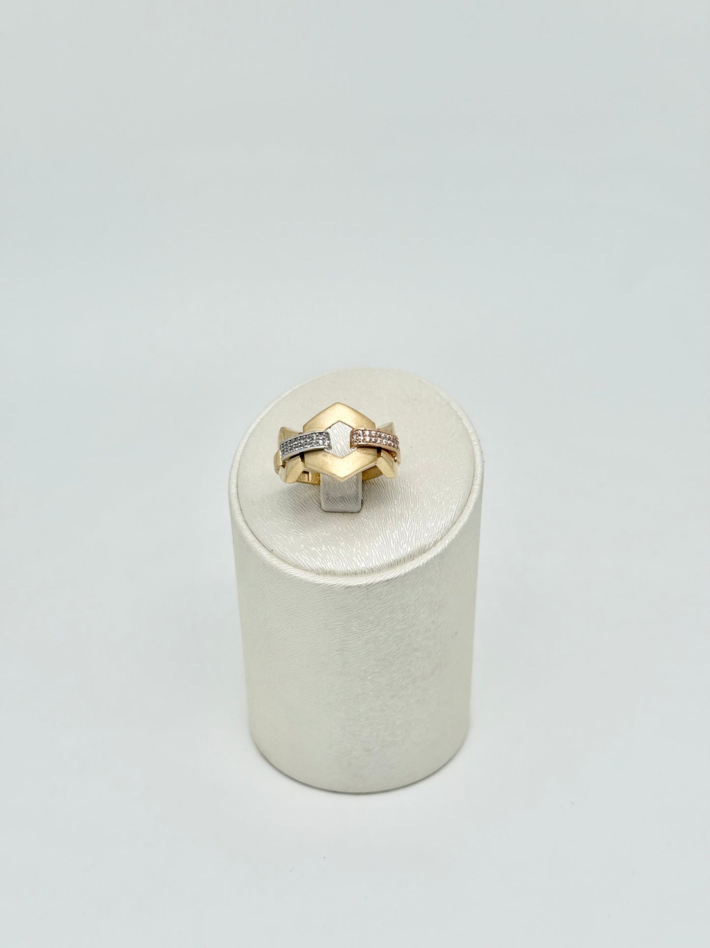 Yellow gold ring with pink and white accents