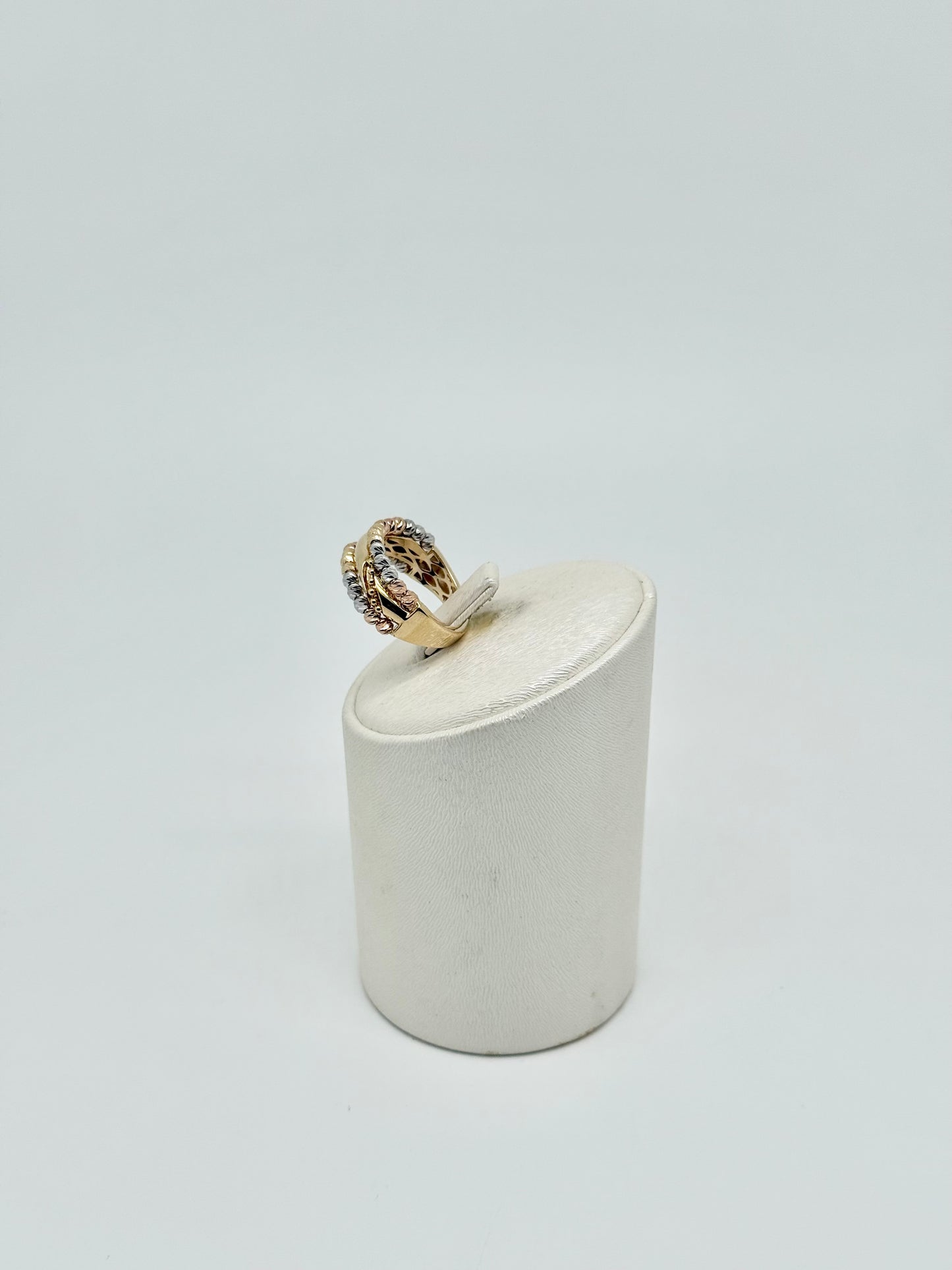 Yellow gold ring with pink and white accents
