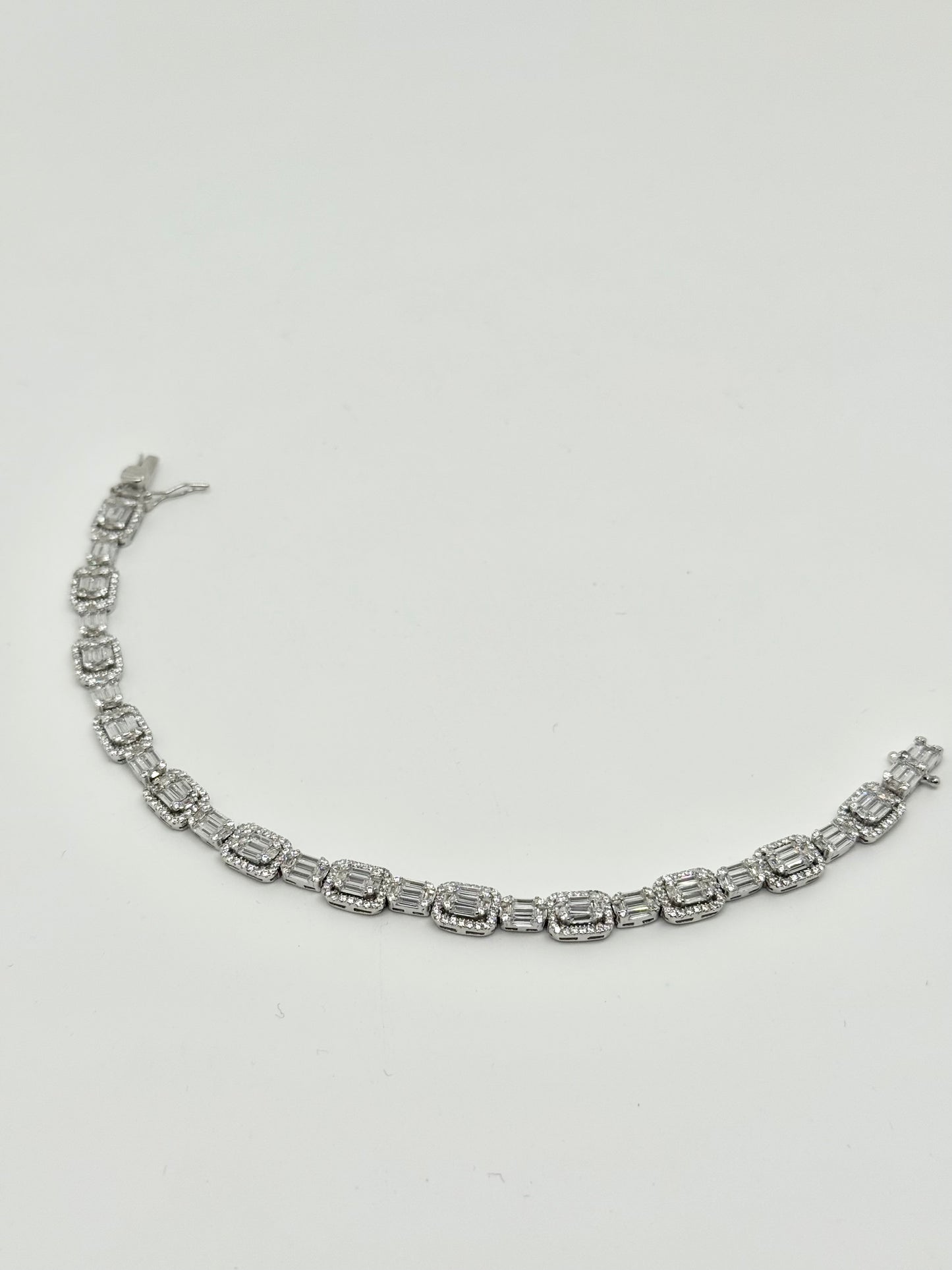 Silver tennis bracelet with emerald-cut zirconia