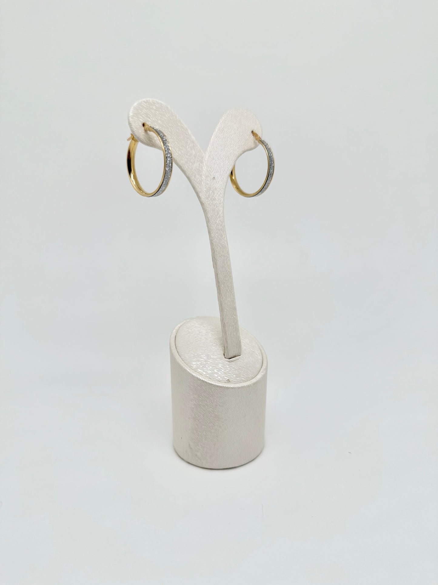 Gold earrings with sparkles