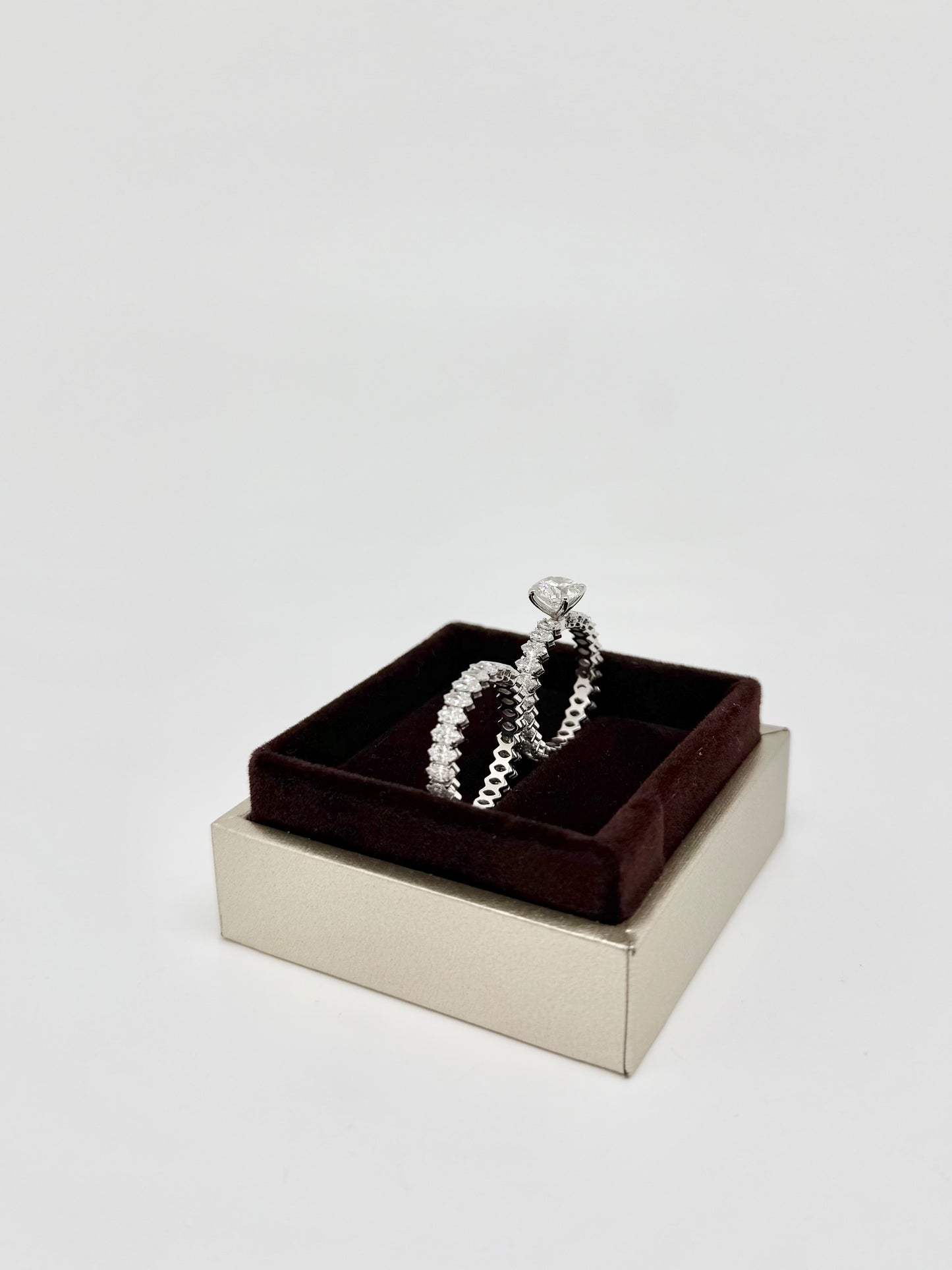 Round brilliant and marquise cut duo ring