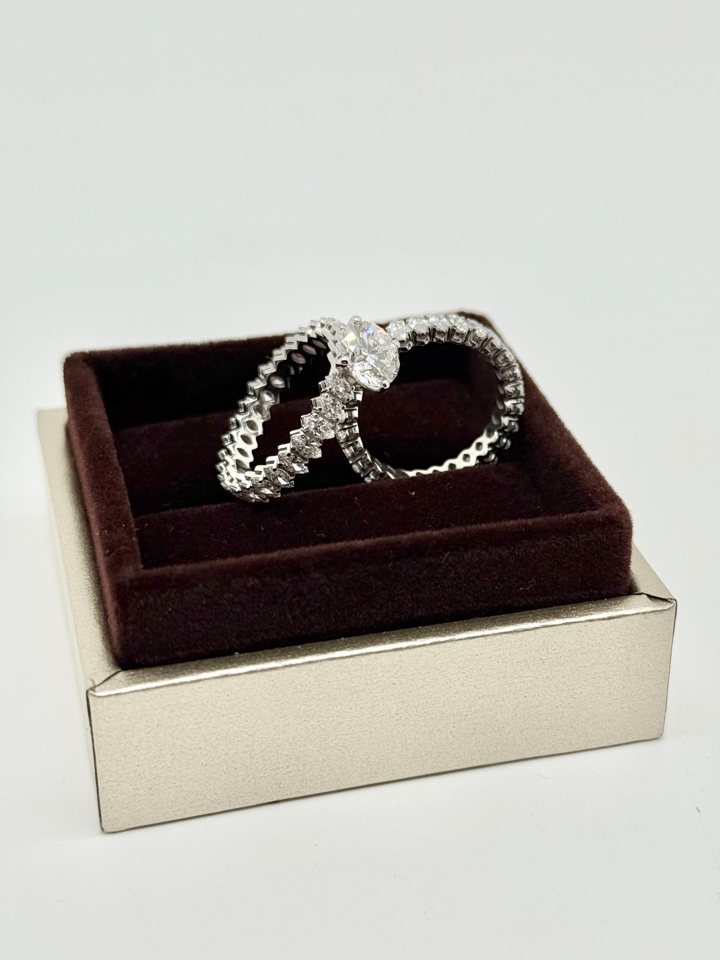 Round brilliant and marquise cut duo ring