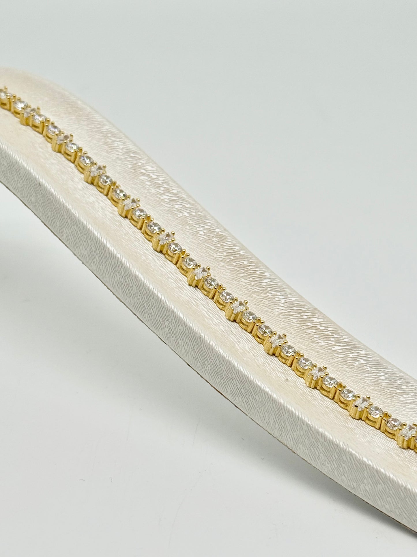 Tennisarmband van 925 sterling zilver verguld met 18-karaats goud - ronde en baguette geslepen briljant zirkoon - 8,94 g