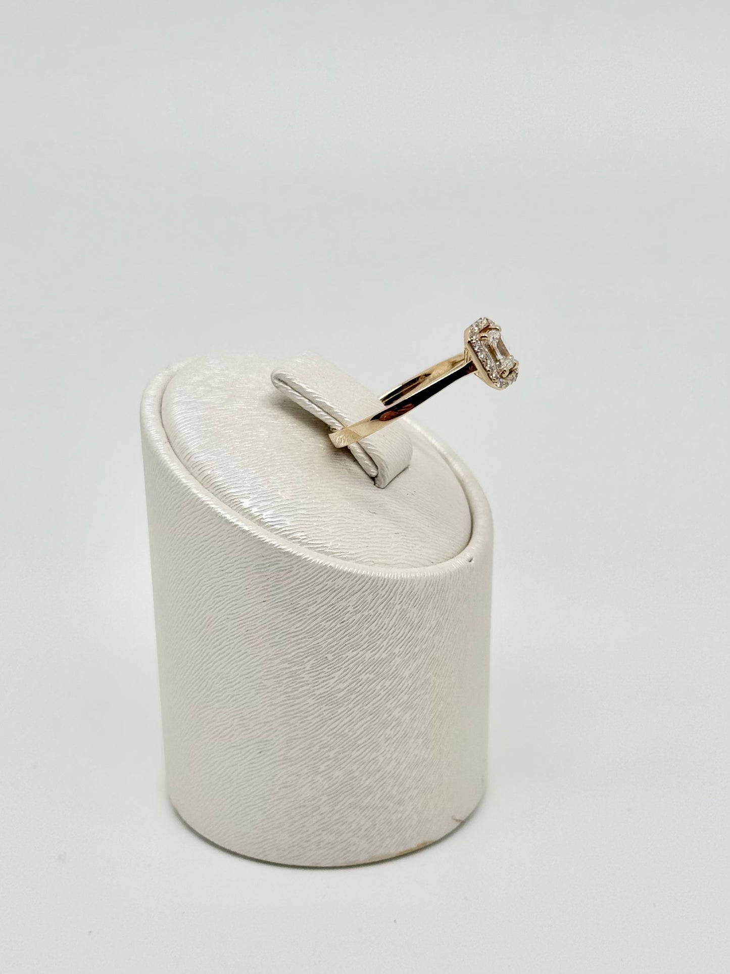 Emerald cut diamond ring
