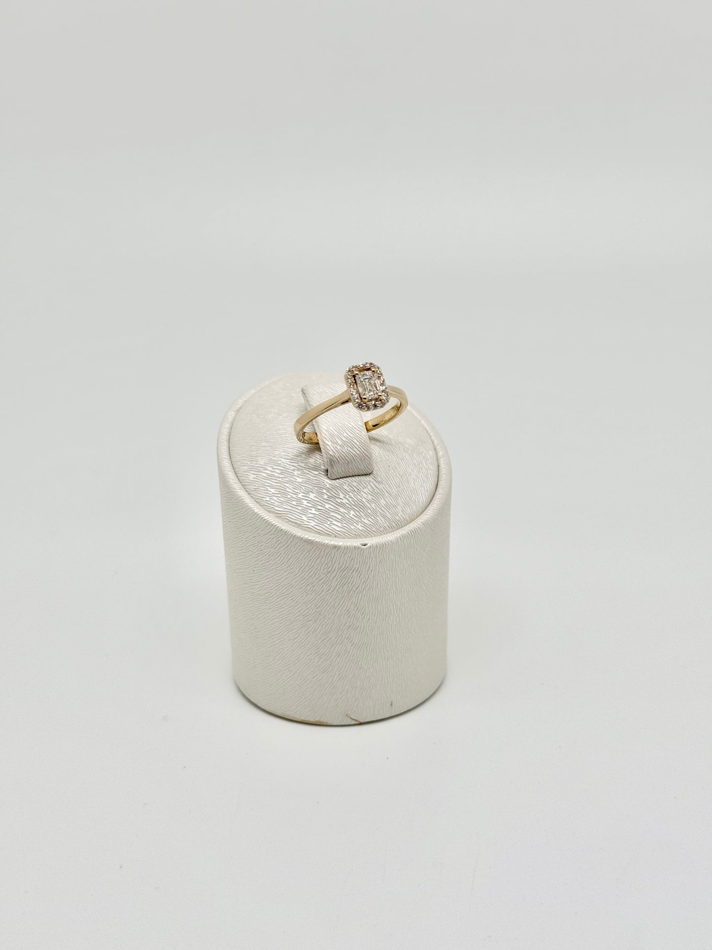 Emerald cut diamond ring