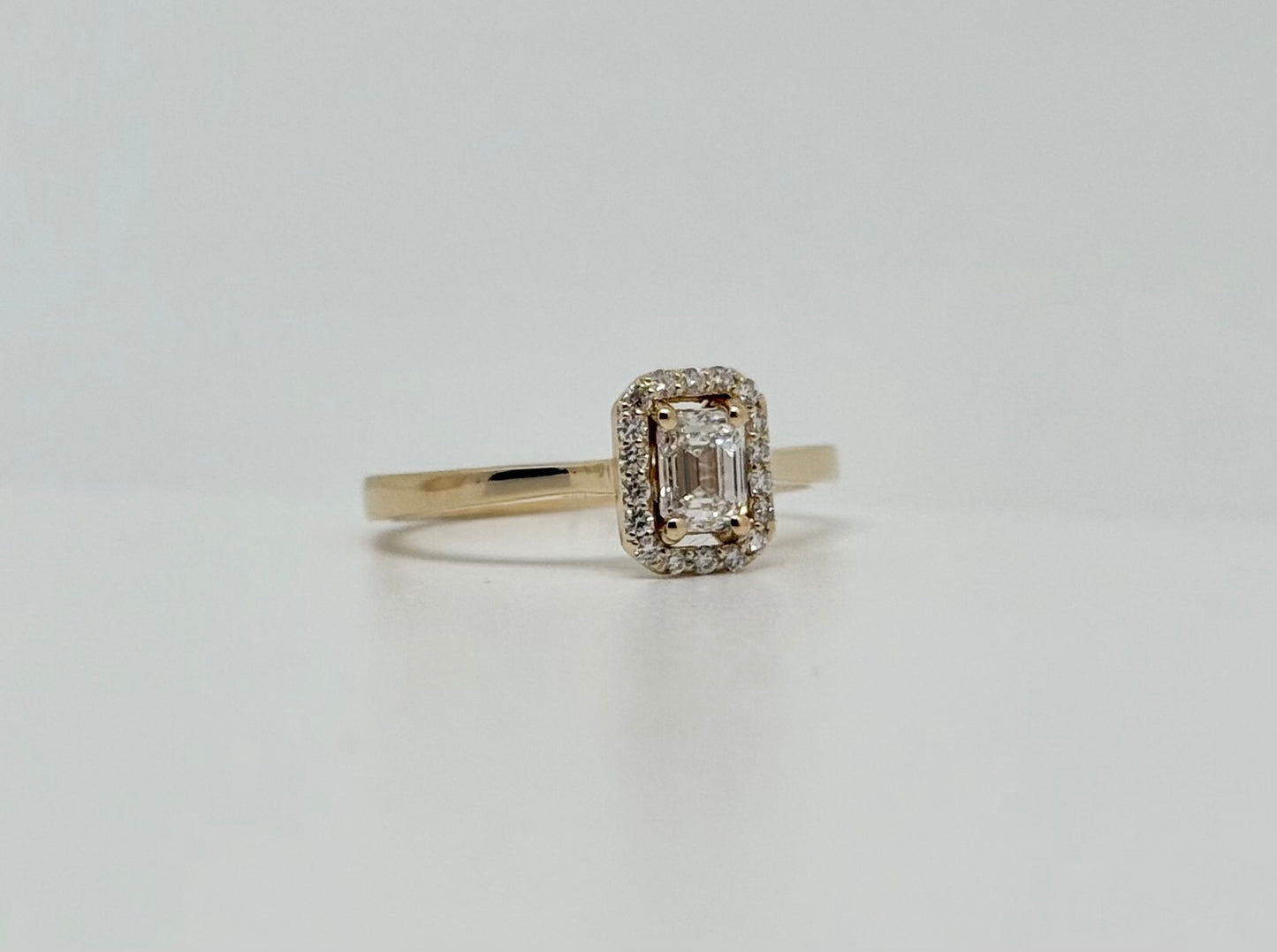 Emerald cut diamond ring
