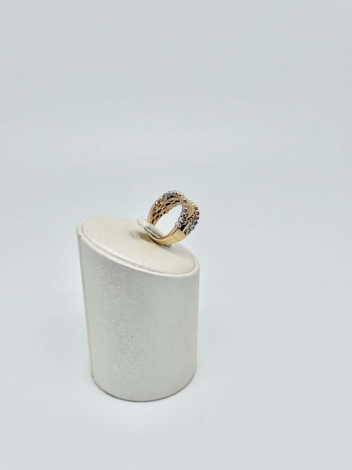 Yellow gold ring with pink and white accents