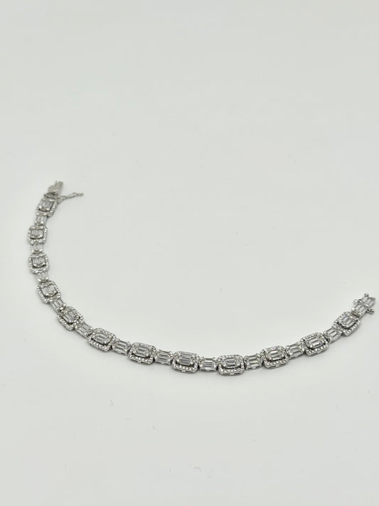 Silver tennis bracelet with emerald-cut zirconia