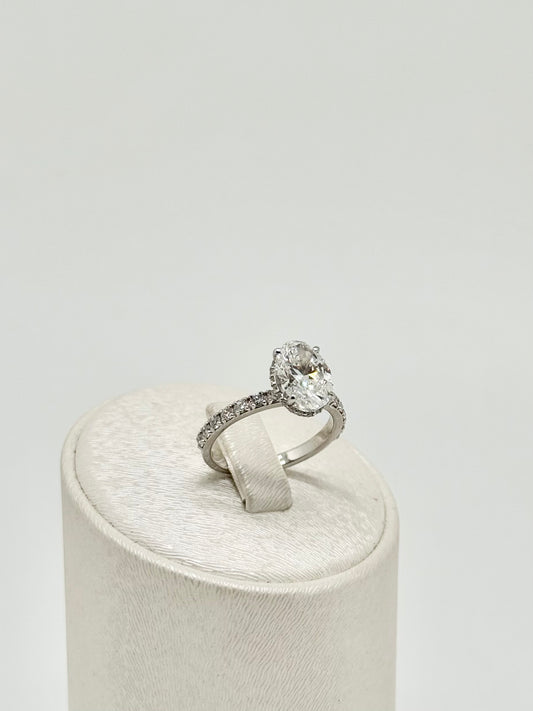 White gold ring set with an oval diamond 
