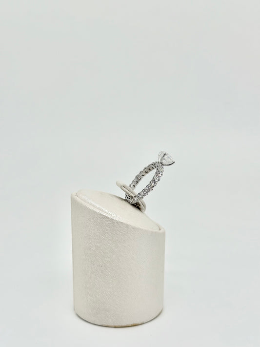 White gold eternity ring set with a 2.01 ct center stone