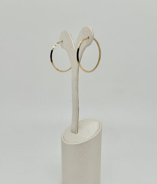 Yellow gold creole, without visible clasp