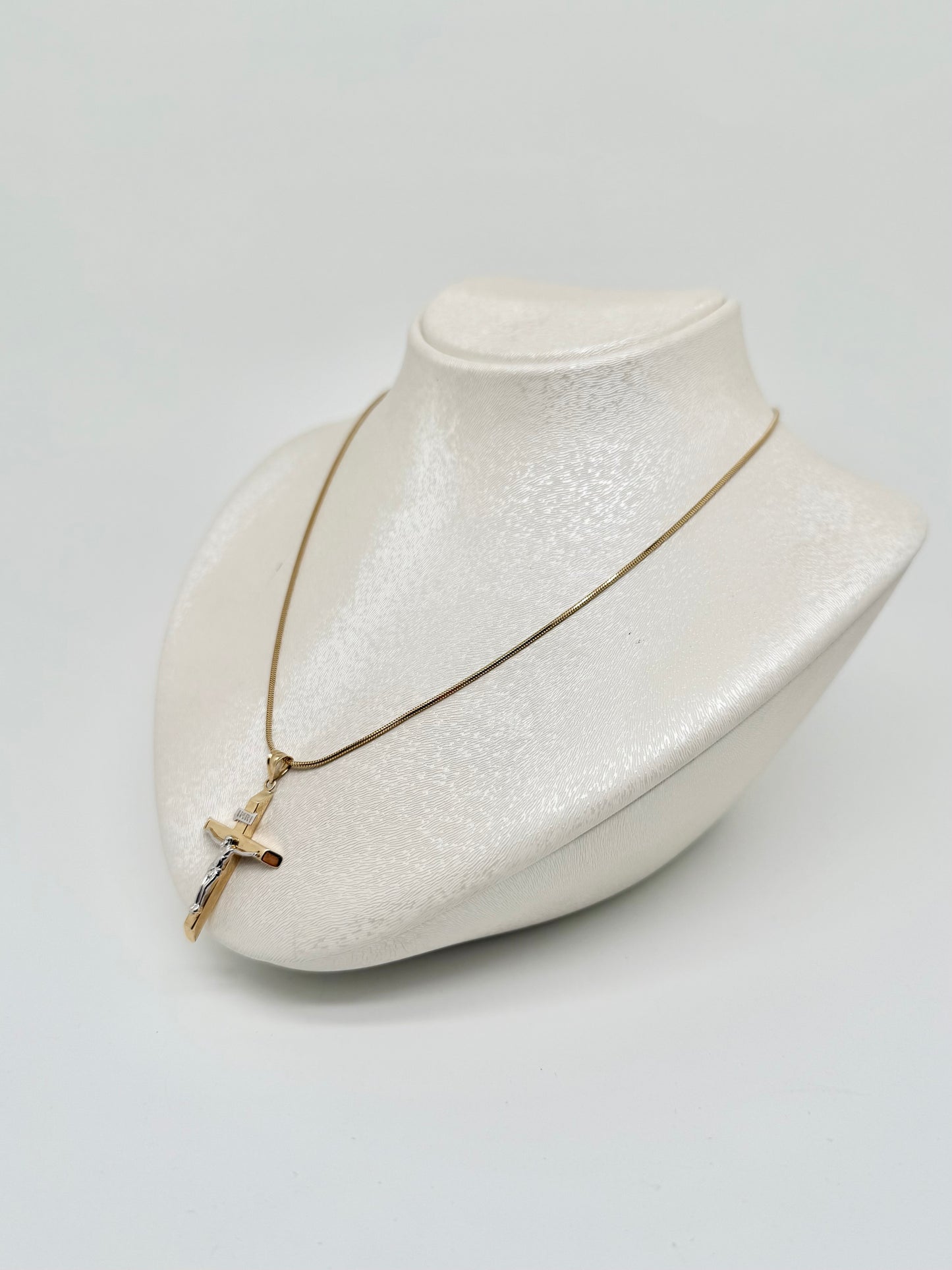 Yellow gold necklace with white and yellow gold cross pendant
