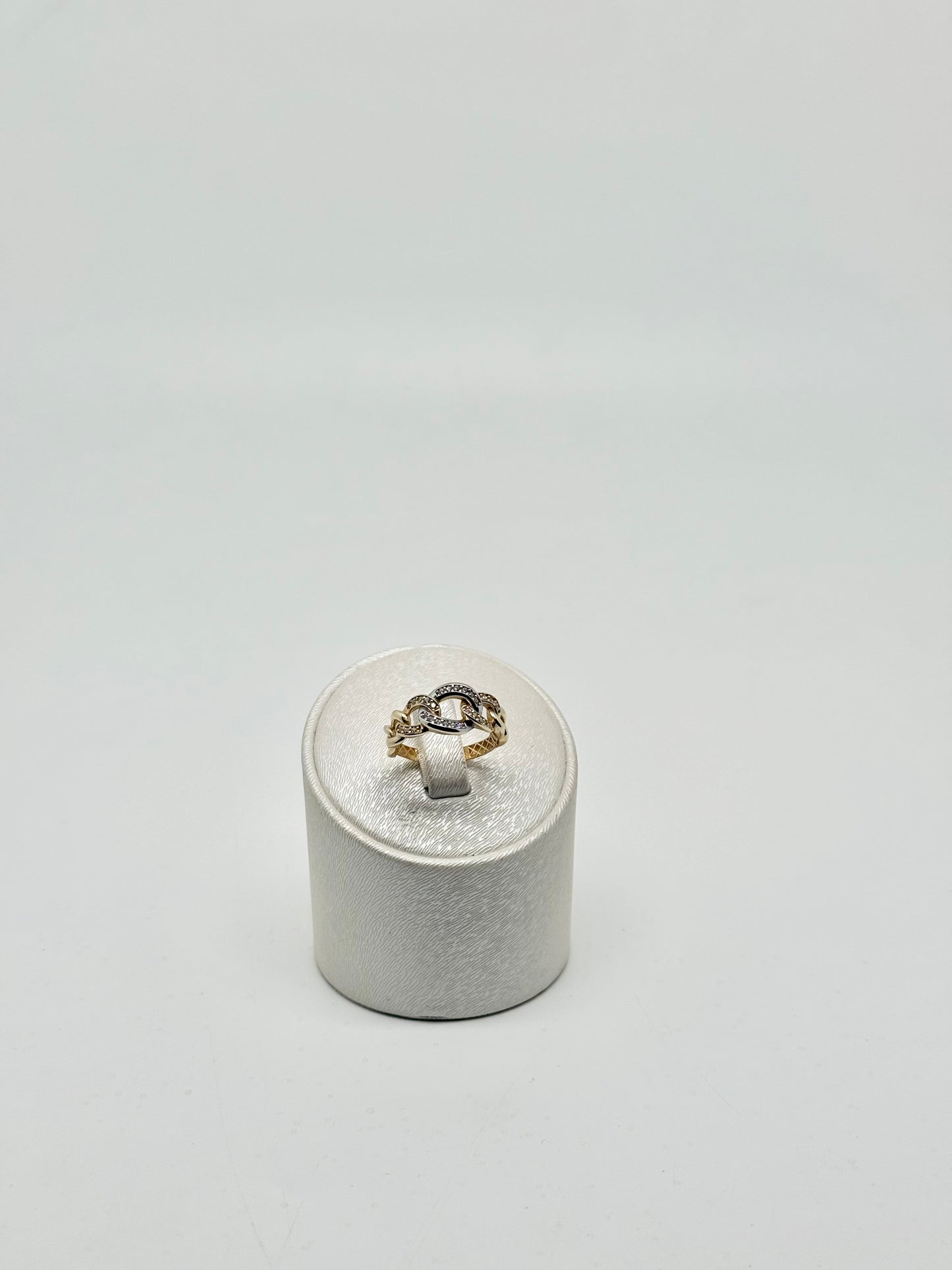 Yellow and white gold ring set with zircons 