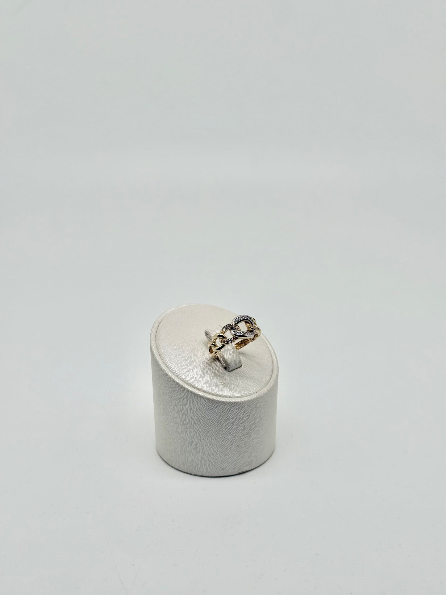 Yellow and white gold ring set with zircons 